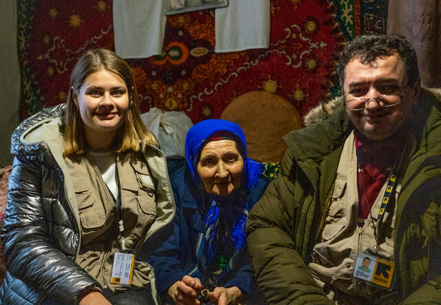 Dr. Oleg and community mobilizer Darina Holub pose with patient Lidia.  