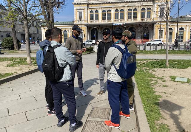 IRC staff provide information to young people at Trieste Central Station