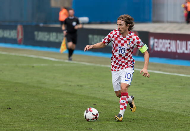 Luka Modrić playing soccer