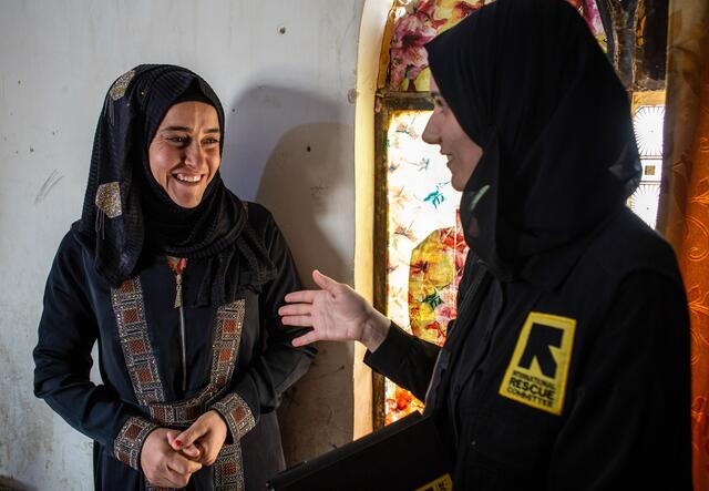 Marwa talks with Enas, 26, one of the clients she is helping to obtain her civil documents. Anbar, Iraq.