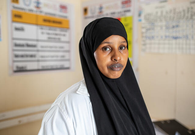 IRC health worker Sadia Ali faces the camera.