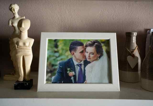 A photo of Khrystyna and her husband in a frame.