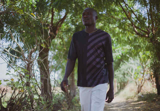 Varvara walking the alleys in his small community in Cameroon