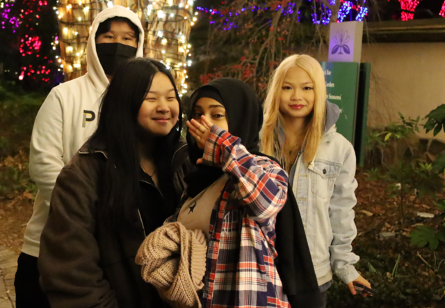 Youth Futures students smile at Garden Lights, Holiday Nights at the Atlanta Botanical Garden.