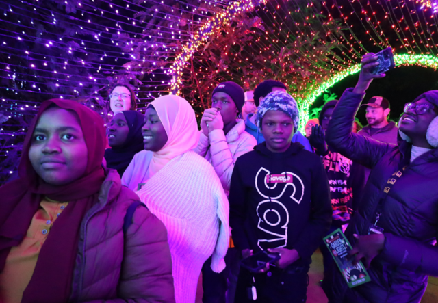 Students walking through the Tunnel of Lights