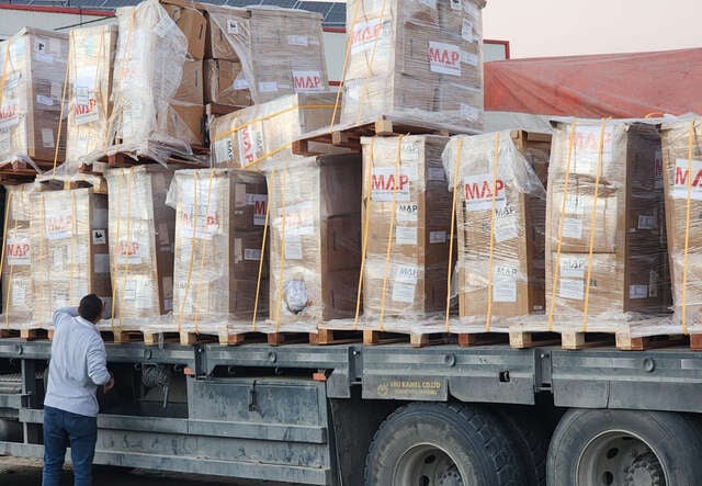 A truckload of medical supplies, marked with the MAP logo, en route to be distributed in Gaza.