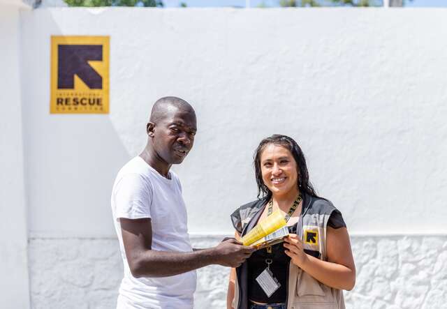 Jean Michael poses for a photo next to an IRC psychologists in Southern Mexico