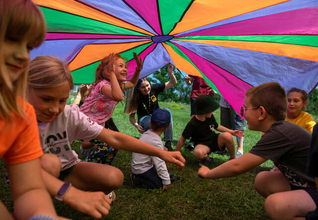 Children from the village attend activities organized by the IRC team.