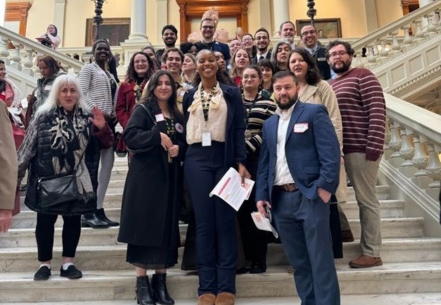 A group photo on the Georgia State Capitol steps.