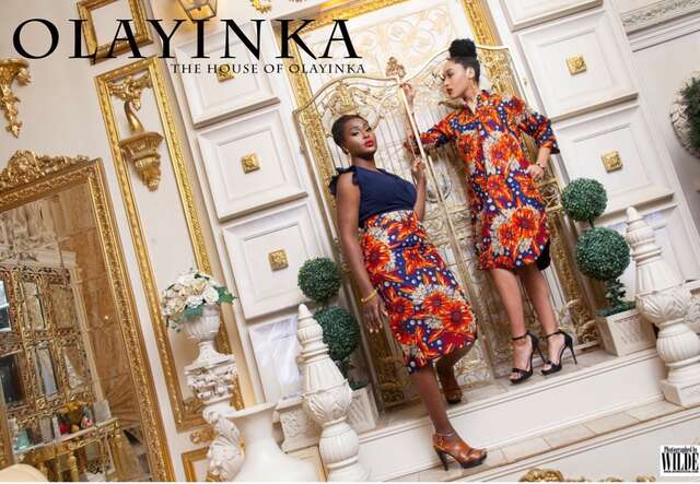 Olayinka and a friend pose at a professional photo shoot for Ayo Designs.