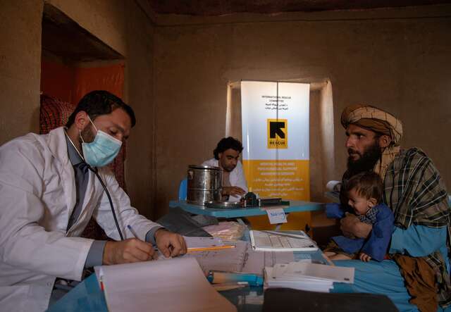 Dr. Abdul Rouf Ibrahimi discusses the health condition and corresponding treatment for 10-month old Shams Ullah with his father, Abdul Haq. 