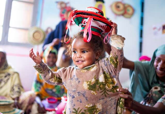 A young girl plays at an IRC safe space in Deder, Ethiopia.
