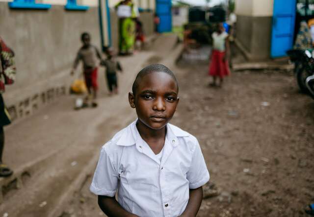 A portrait of a school-aged child in the DRC.