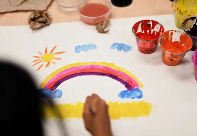 A child creates a piece of art at the IRC's Welcome Center in Phoenix, Arizona.