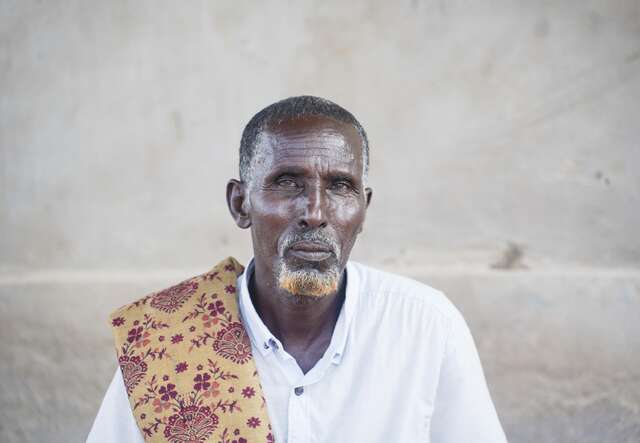 Somali Man looks at camera