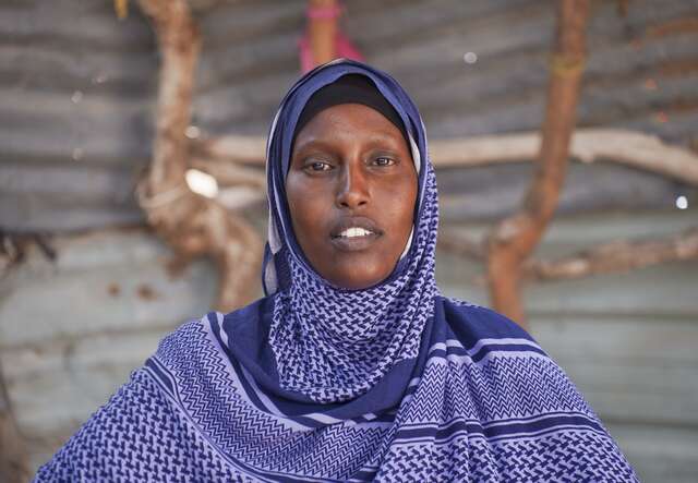 Somali women at shelter looking into camera