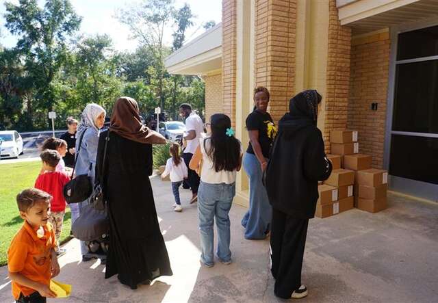 Distributing food boxes to families
