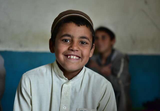 Child smiling at the camera