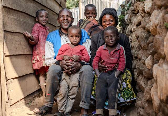 DRC, South Kivu province, Numbi. Surrounded by her family, Imani is radiant. The laughter of her loved ones has replaced the turbulence of her past.