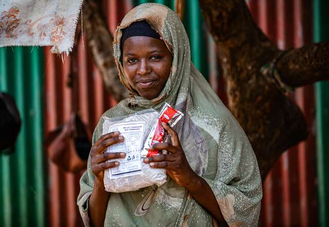 Shukri with nutrition supplements from the L6 Health Post in Dadaab.