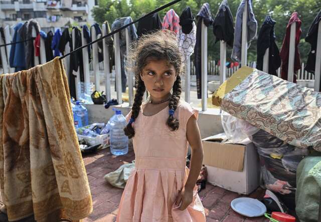 A young displaced refugee, pictured on the street of Beirut, Lebanon.
