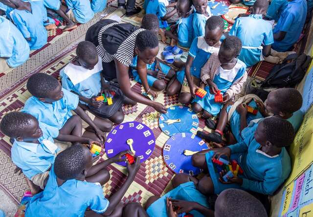 Students play and learn together at an IRC supported school in Uganda.