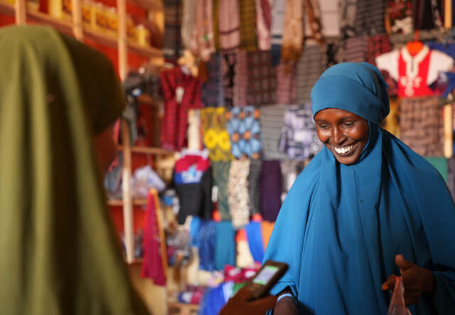 Women selling fabric