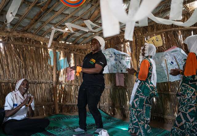 Psychosocial officer Wazouna Mai and Bebata singing the special Girlshine song together with the teenage girls.