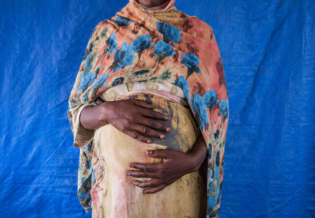Portrait of Mariam* at Materity Ward in IRC clinic in Aboutengue refugee camp.