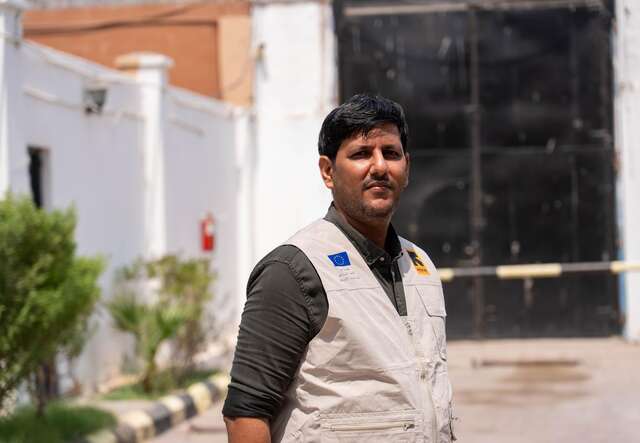 Dr Ahmed 3/4 profile looking at the camera 