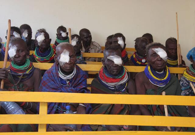 People wait outside the centre after receiving treatment on their eyes. Surgeons, paediatricians, ophthalmologists, dentists and gynaecologists came to Kakuma for 10 days, where specialist doctors are not usually available.