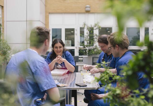 Anxhela has lunch with her colleagues outside of the hospital