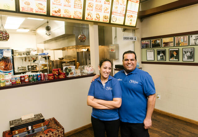 Salam Bunyan with his wife at their Boise retaurant