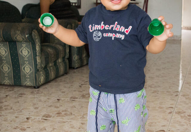 Matías with his mother Cibel at home