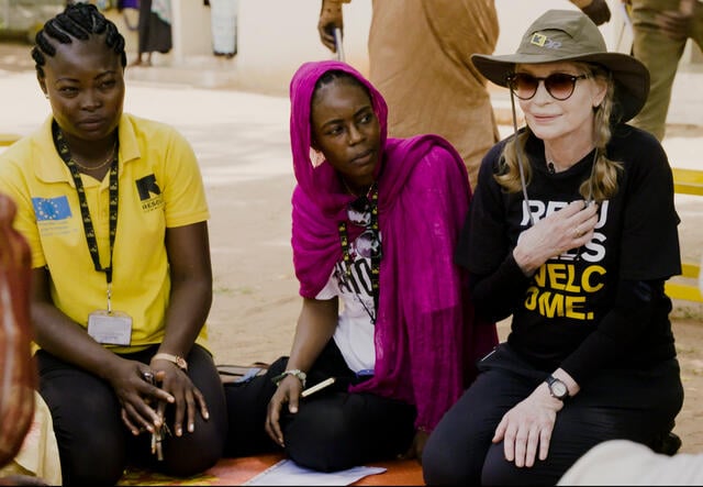 Actress and voice for the International Rescue Committee Mia Farrow joins IRC staff at a malnutrition education session for families in Chad.