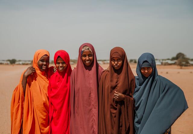 Five girls standing together