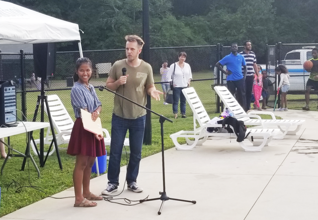 Clarkston Mayor, Ted Terry, introduces Open Mic host, Nuam San.