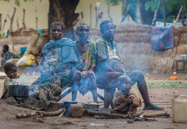 A family in a makeshift camp set up for displaced people in Kaga Bandoro where the IRC is providing support.