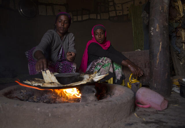 Two Ethiopian women cooking during a drought