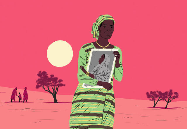 Obioma, a woman travelling the Central Mediterranean route, holds a photo of her children tight to her chest. She is nearly alone in a barren landscape, with a family of three and two short trees in the distance behind her..