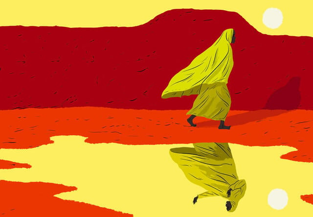 Marie, a woman who journeyed from Cameroon to Niger, walks next to a lake that shows her reflection. She is wearing a yellow head scarf and there is a red mountain behind her. 