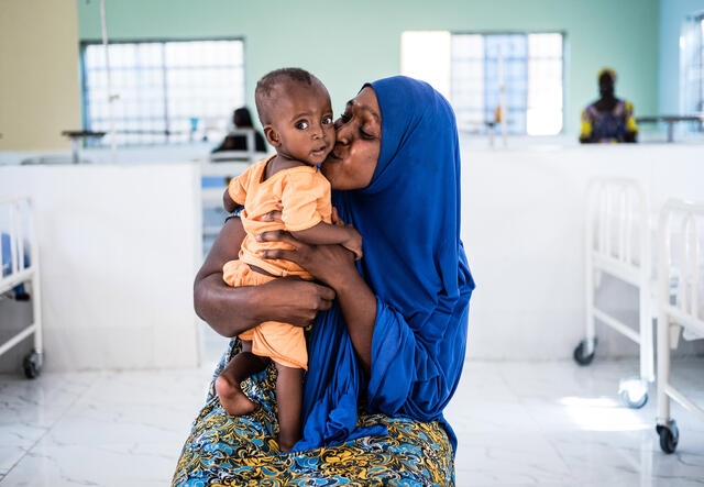 Binta holds her baby boy Ali at an IRC health center in Nigeria where he was being treated for acute malnutrition