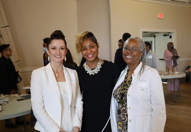 Marietta Murton, Business Development Coordinator at the LAA, Shelleyan Lewars and Brigitte Bowser, Financial Coach at the IRC in Atlanta, all smiling for the camera.
