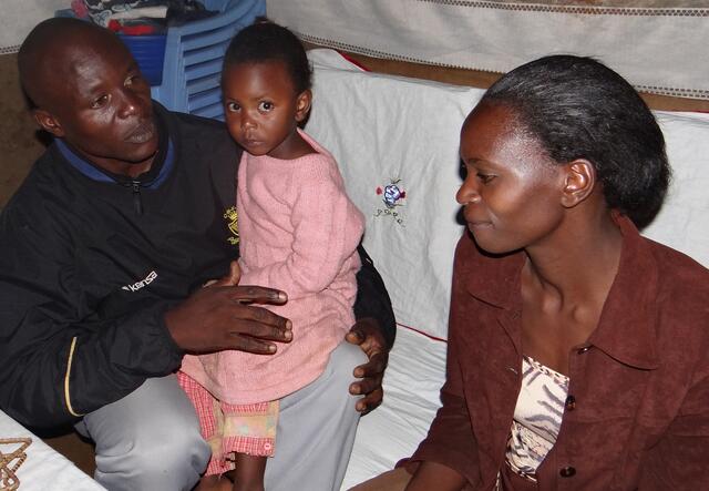 Andrew with his wife and daughter