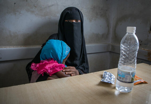 A woman and child at an IRC health clinic in Yemen