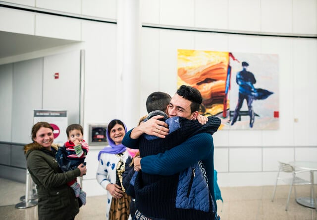 Adil Kheder Nimr, a Yazidi refugee, was reunited with his family on February 10. in Tukwila, Washington after they were banned from entering the U.S. 