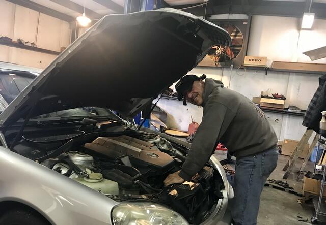 Mohammad at work at The Best Works Auto Care Center in Roswell.