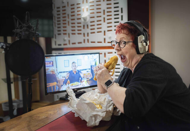 Jo Brand eating fish and chips