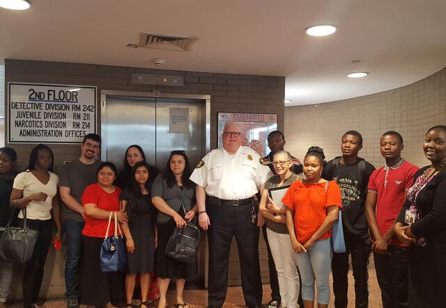 Elizabeth clients tour the Elizabeth Police Department, led by the police chief.