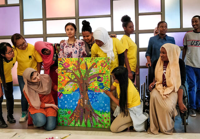 Students created a collaborative art piece representing their roots and their dreams.